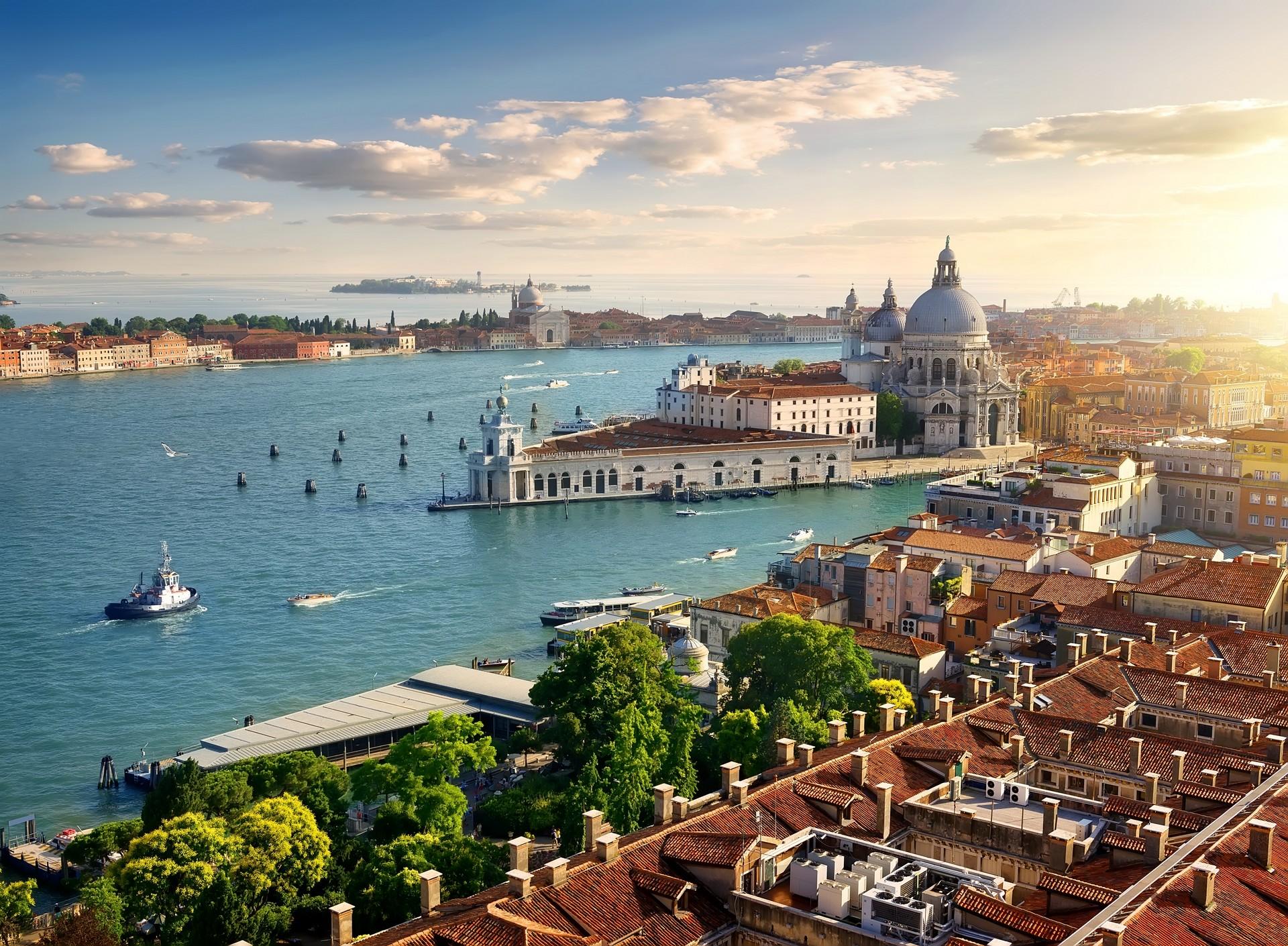 Aerial view of boat in Venice in partly cloudy weather