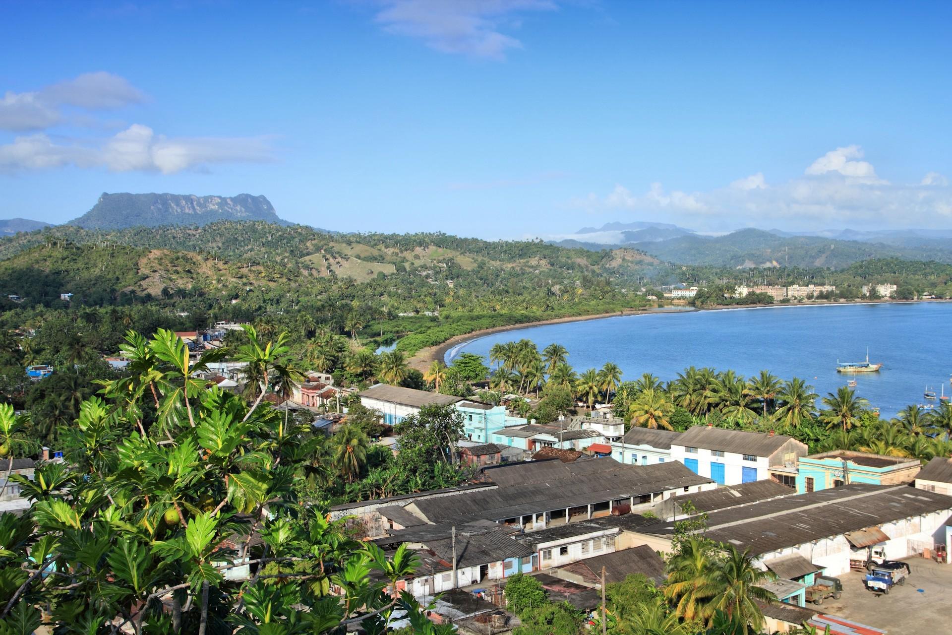 Aerial view of countryside in Baracoa in sunny weather with few clouds