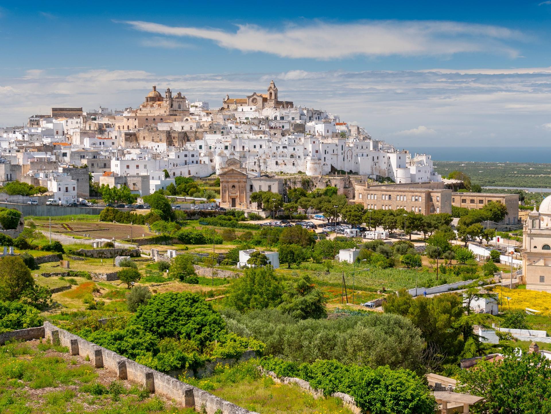 Aerial view of architecture in Ostuni on a sunny day with some clouds