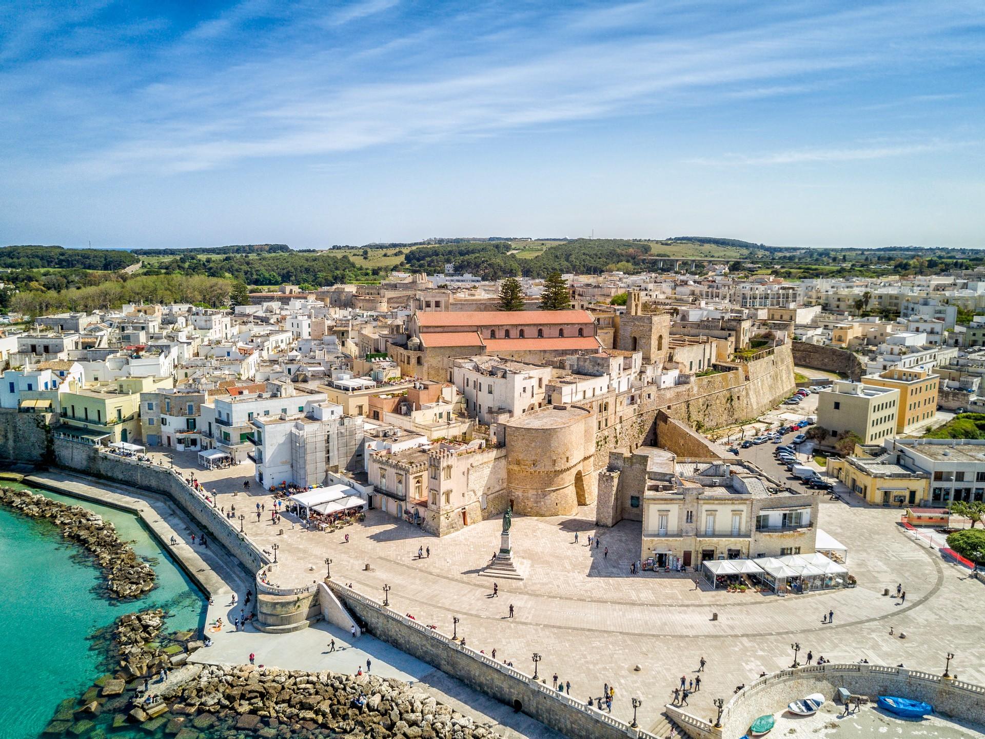 Aerial view of architecture in Otranto in sunny weather with few clouds