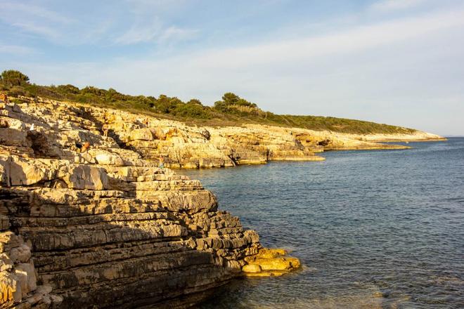 View of a rocky coast in Kamenjak national park surrounded by the sea