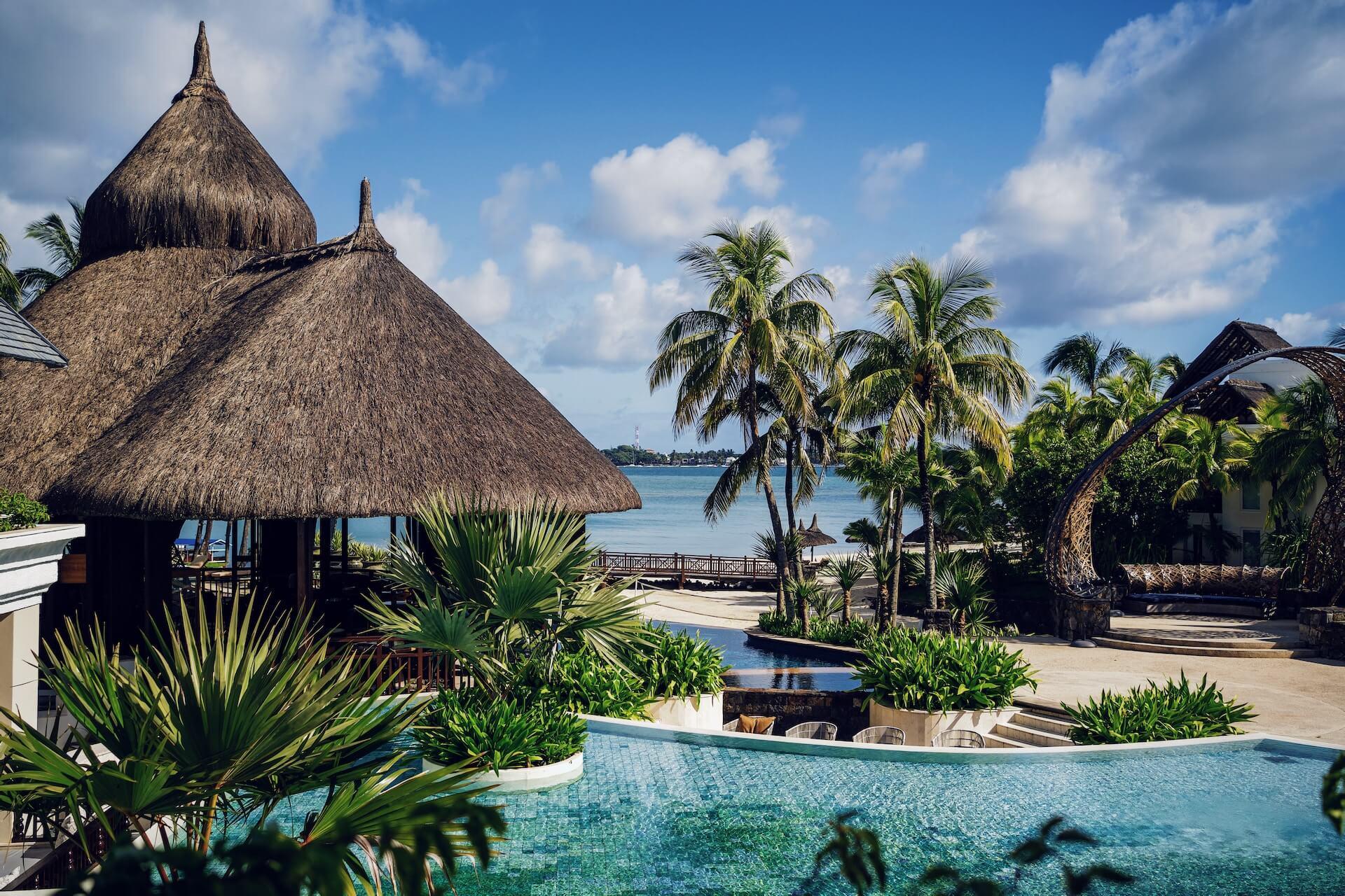 A view of the Mauritian resort, palm trees, and the sea