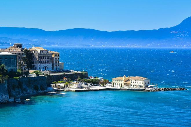 View of the end of Corfu Town and a pier on the sea