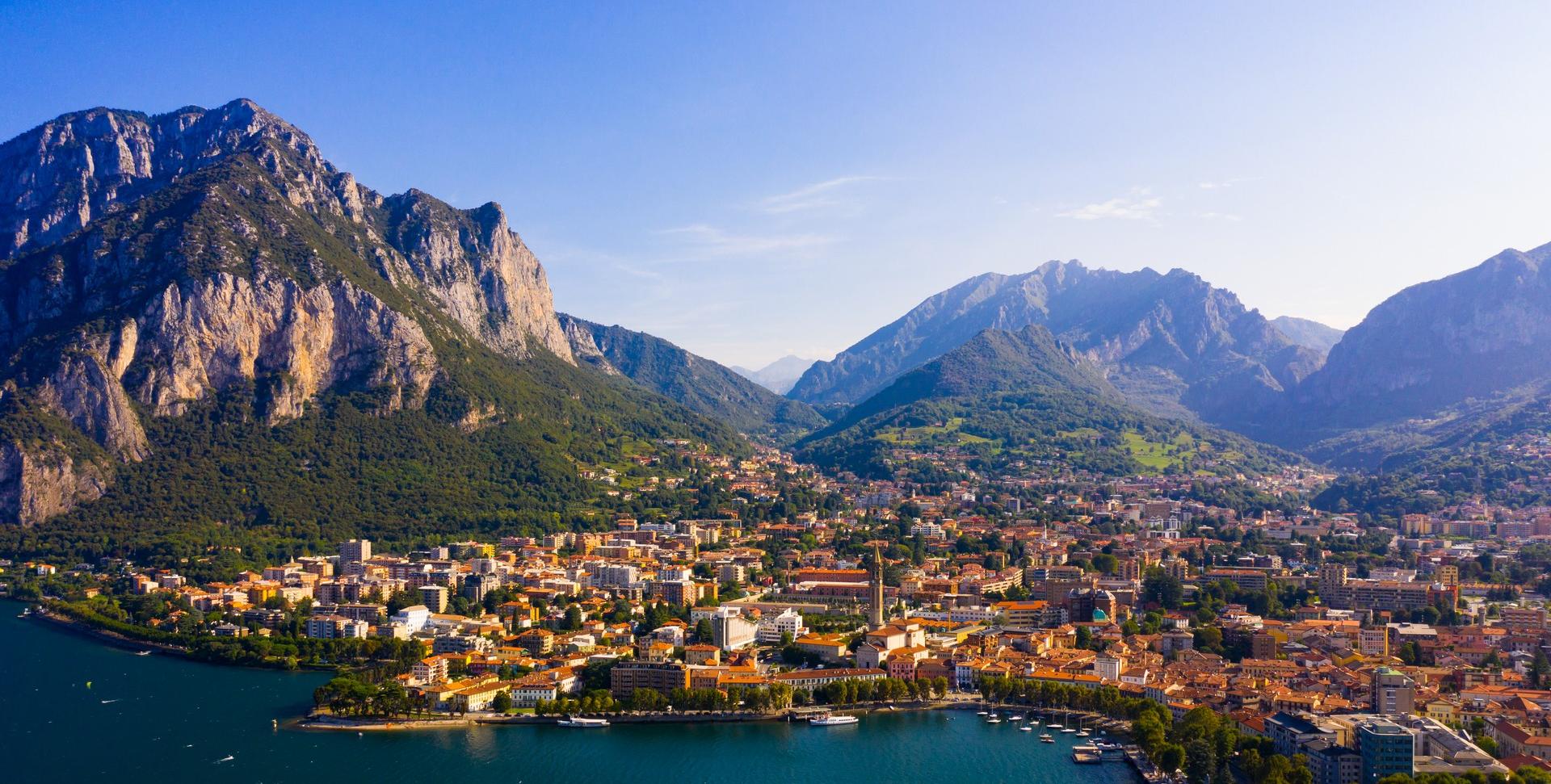 Aerial view of mountain range in Lecco in partly cloudy weather