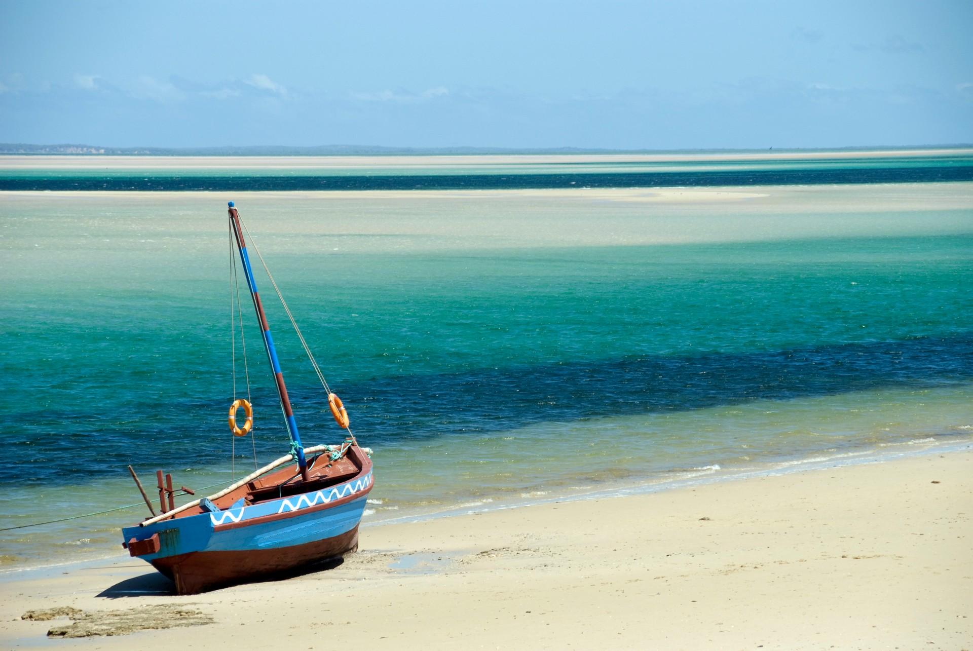 Awesome beach with turquise sea in Mozambique on a clear sky day