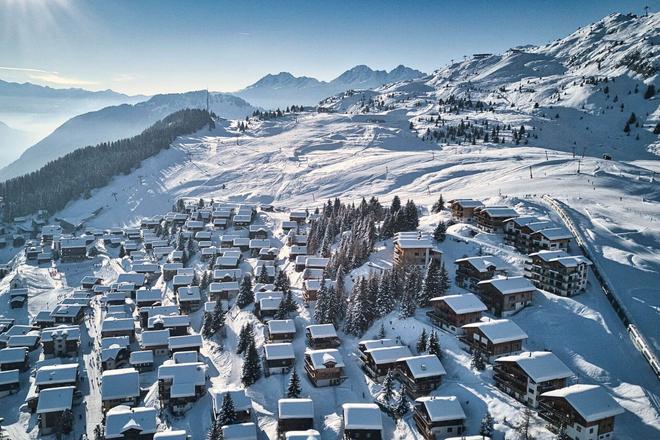 Aerial view of snowy houses in Bettmeralp, Aletsch