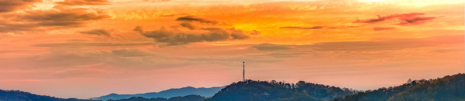 Aerial view of mountain range in Gatlinburg at sunset time