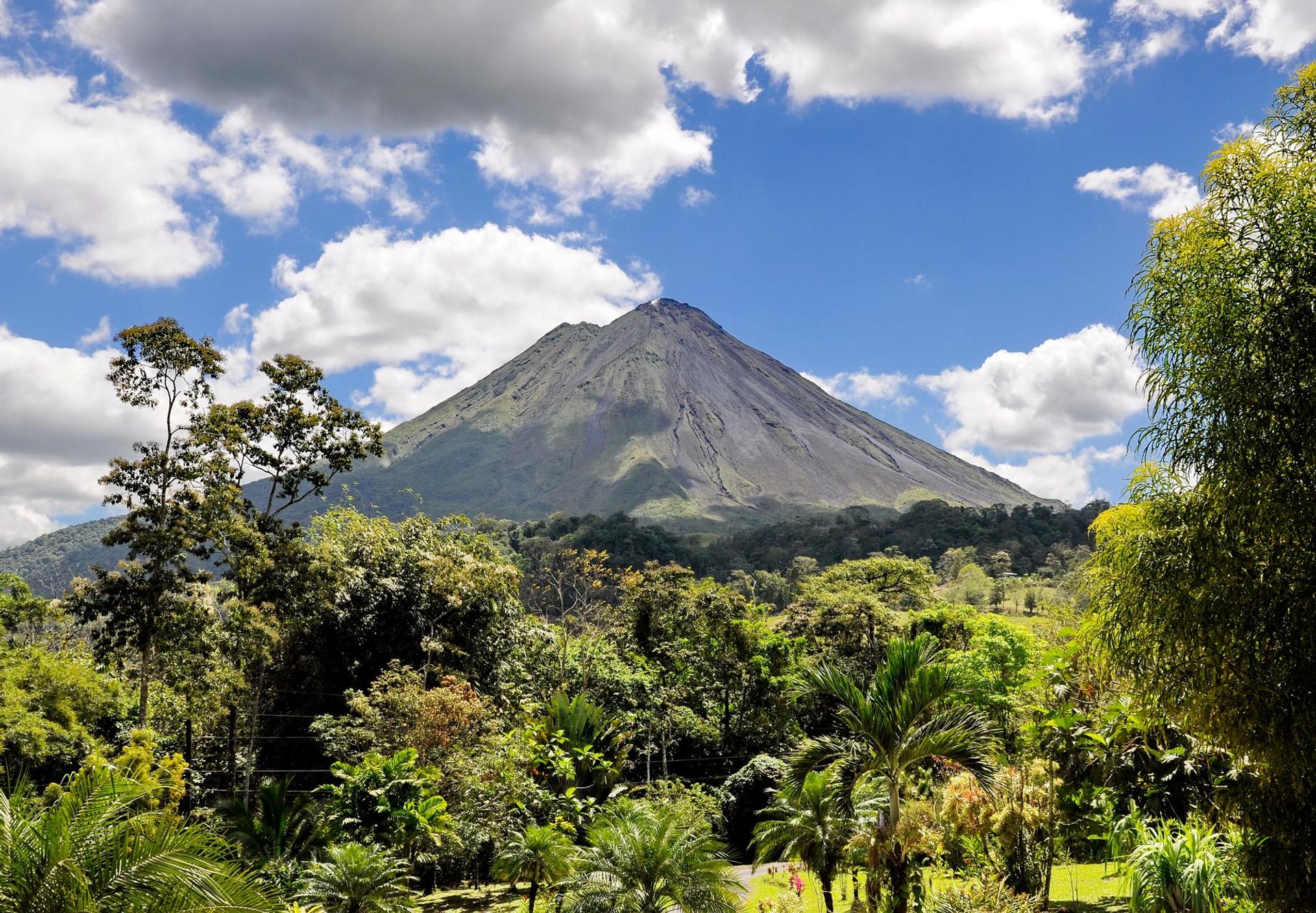 Mountain range near La Fortuna on a sunny day with some clouds