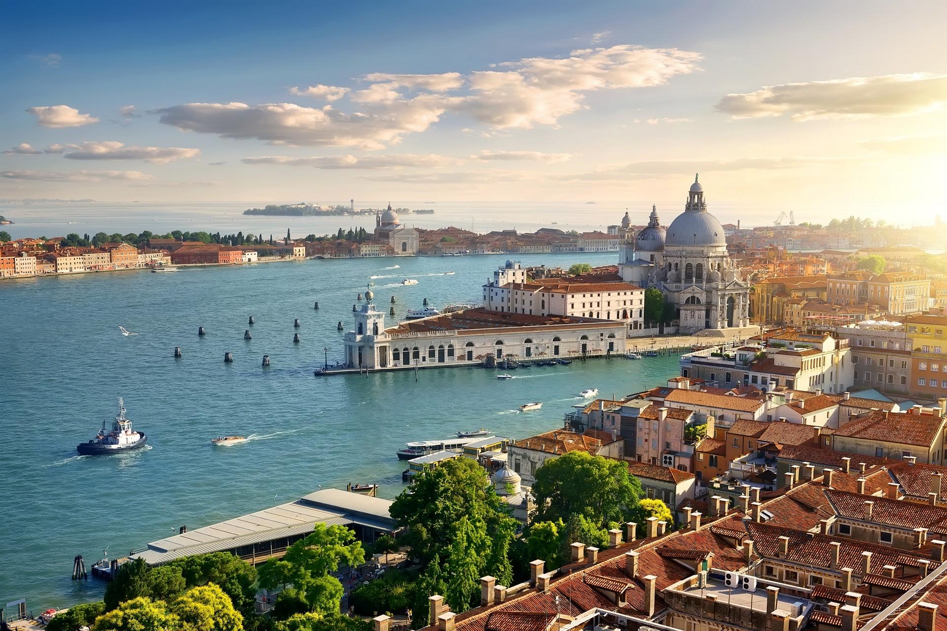 Aerial view of boat in Venice in partly cloudy weather