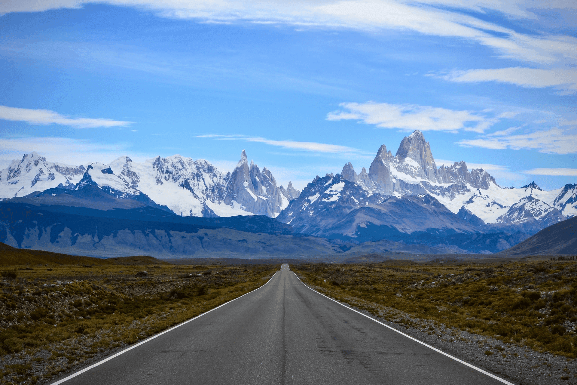 A road with mountains in the background in Argentina