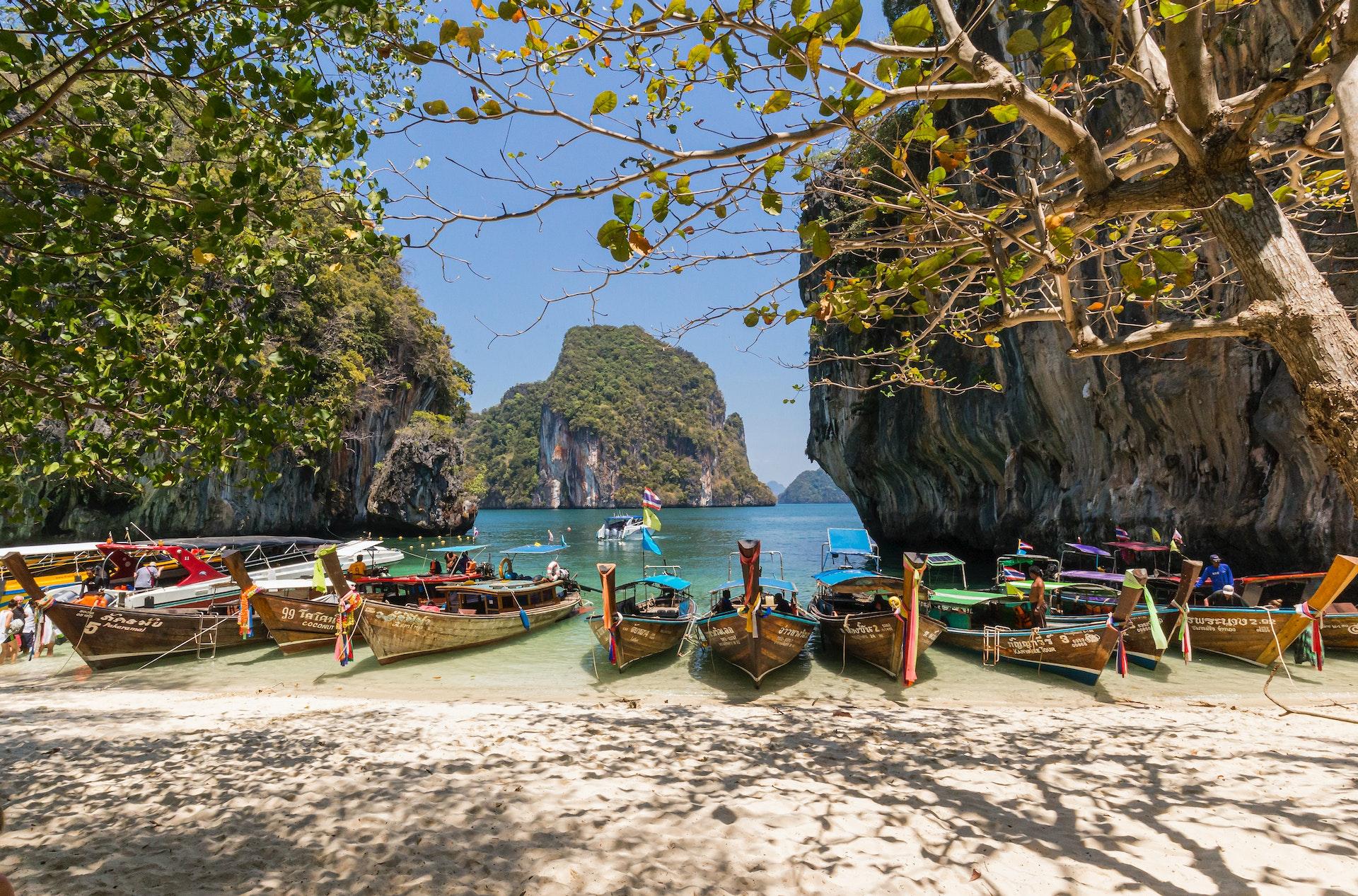 Thailand Mae Hong Son Province: colored boats at the shore.