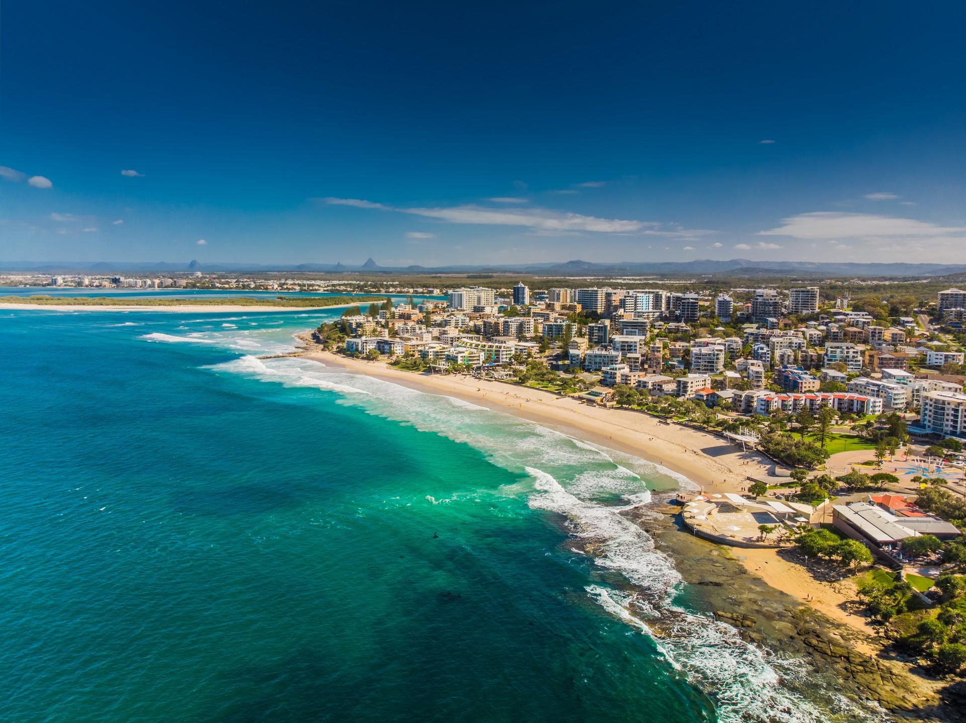 Enjoyable beach with turquise water in Caloundra on a sunny day with some clouds