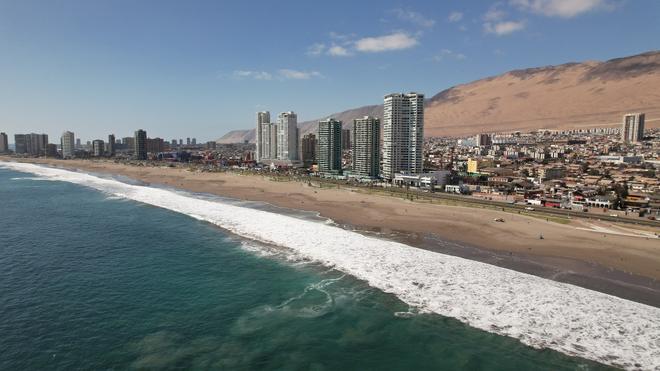 Iquique in Chile with beach and buildings in the desert.