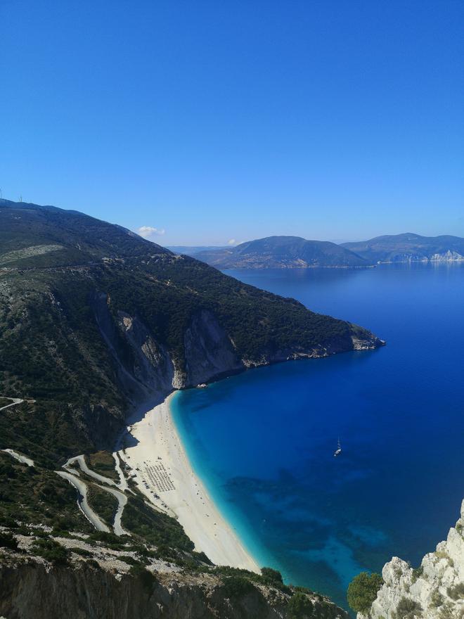 Greece – West coast: beach in the middle of the hills.
