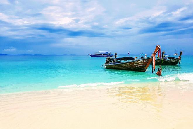 Boats on a crystal-clear sea in Phuket