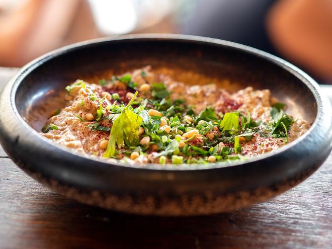 Fresh Israeli Hummus served in a bowl.