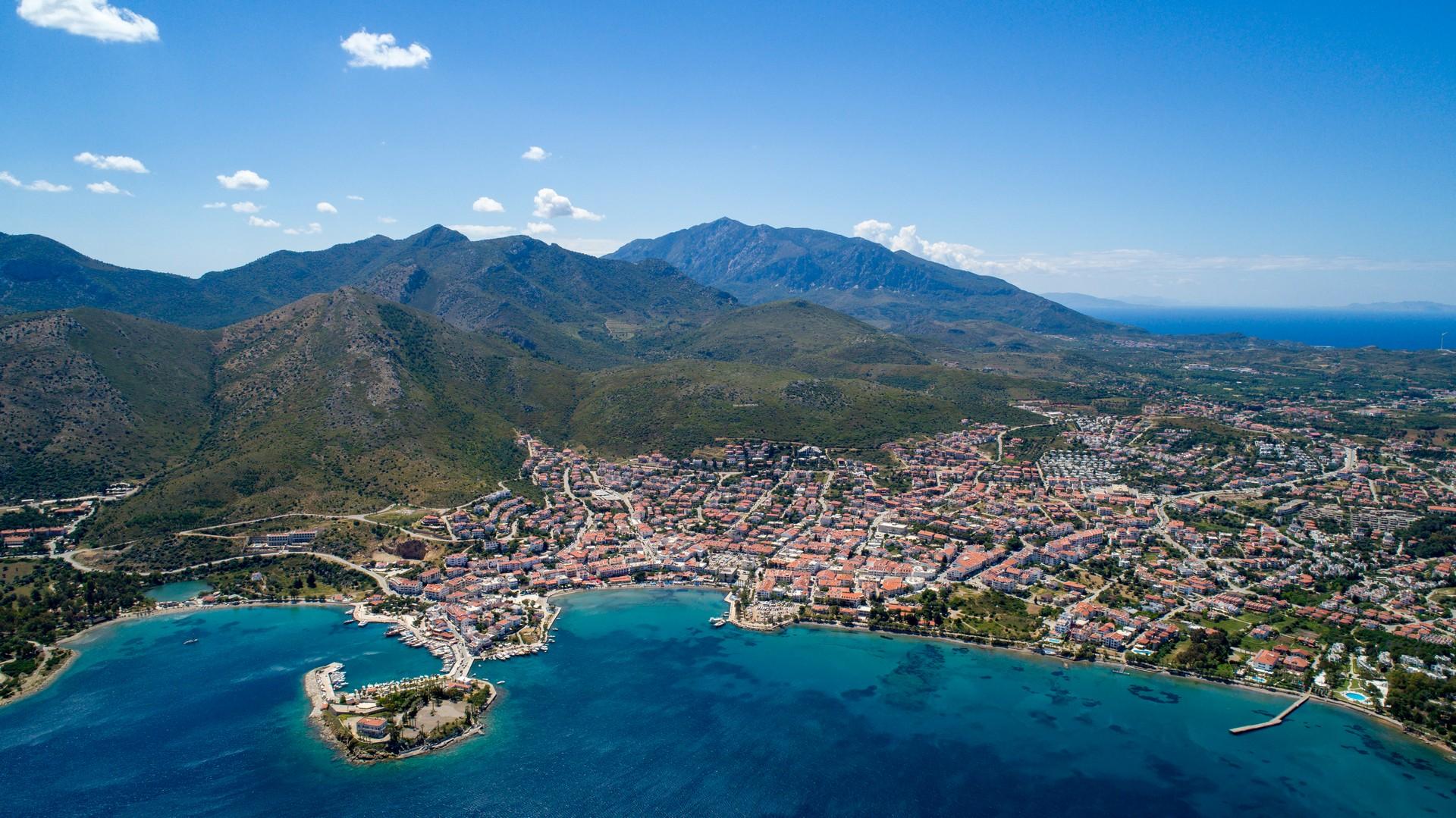 Aerial view of mountain range in Datça on a sunny day with some clouds