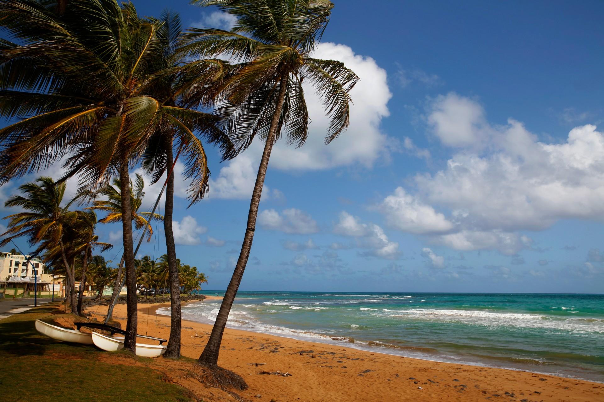 Awesome beach in Luquillo in sunny weather with few clouds