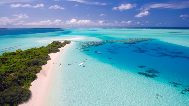 Maldives beach and white sand from above.