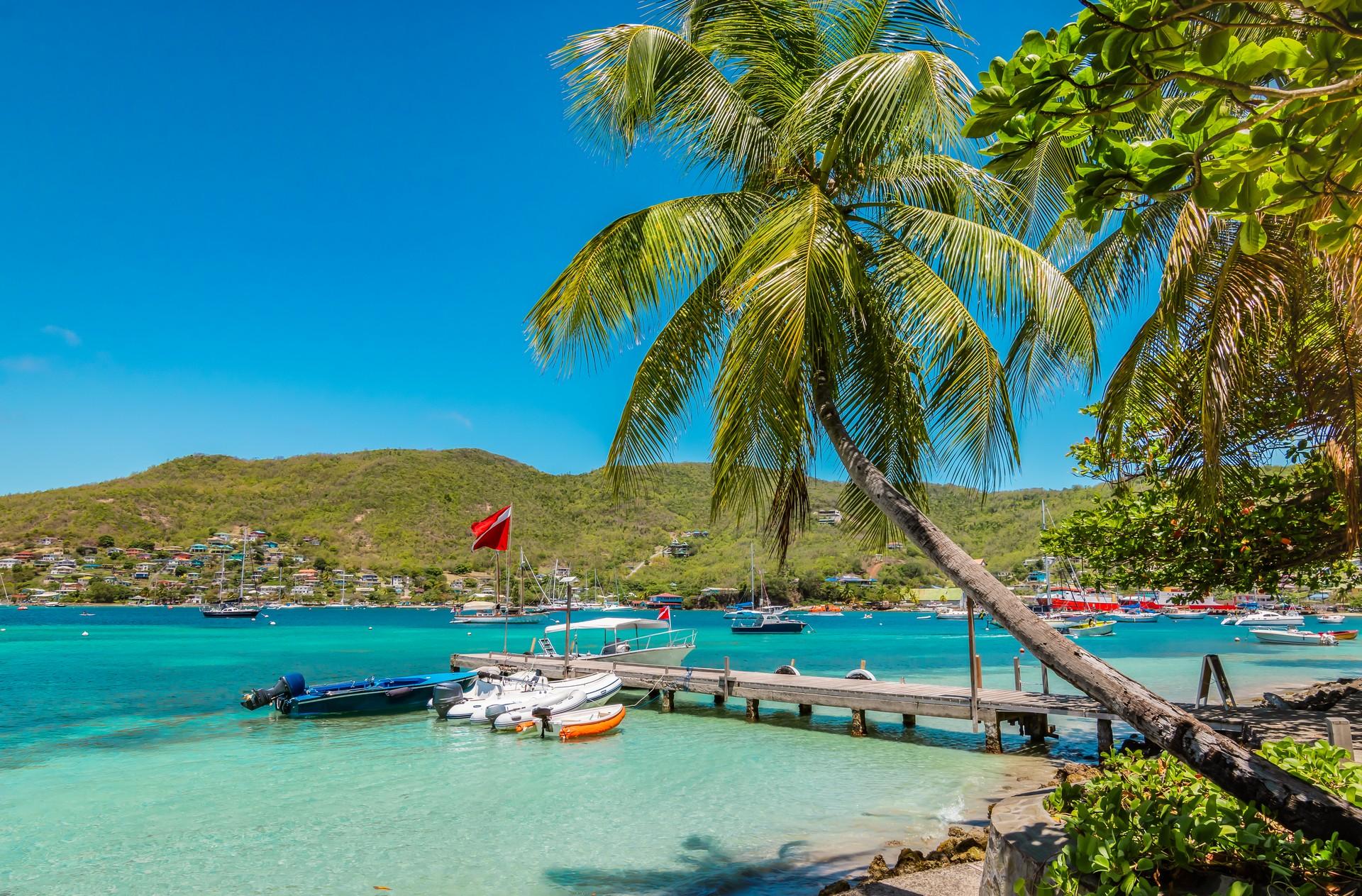 Amazing beach with turquise sea in Bequia Island with nice weather and blue sky