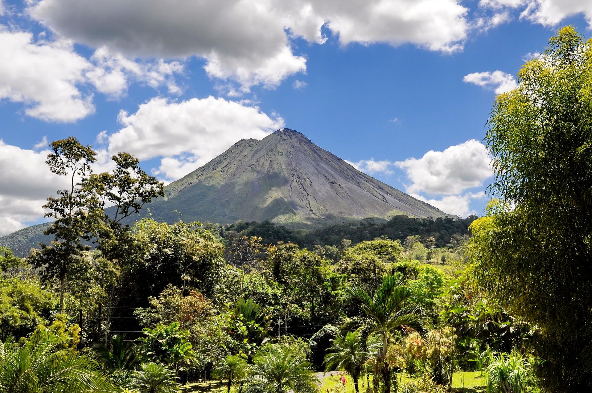 Mountain range near La Fortuna on a sunny day with some clouds