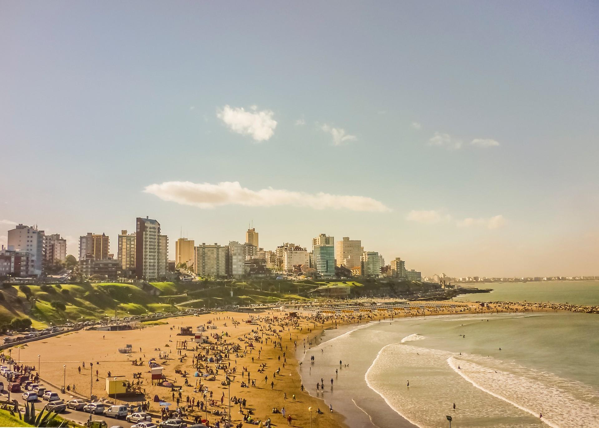 Aerial view of beach in Mar del Plata in sunny weather with few clouds