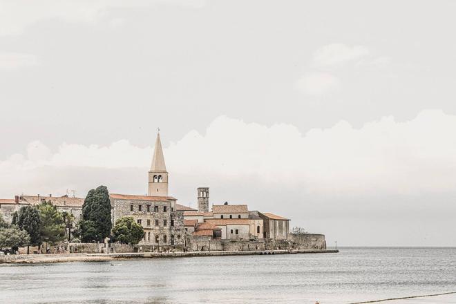 View of the city of Poreč and its Euphrasius Basilica surrounded by the sea
