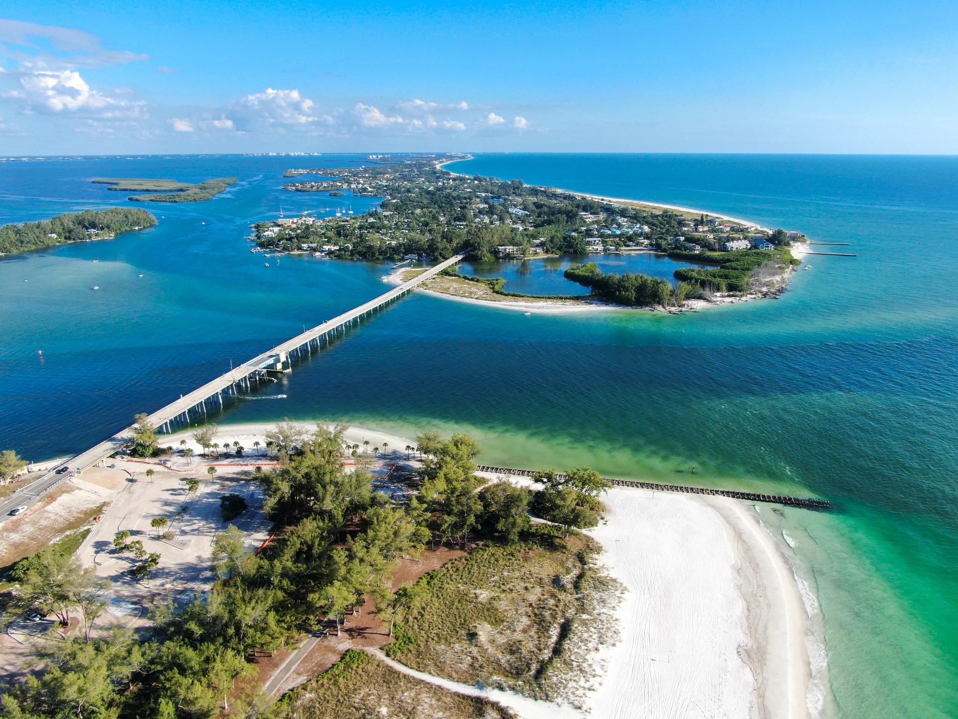 Aerial view of beach in Longboat Key on a sunny day with some clouds