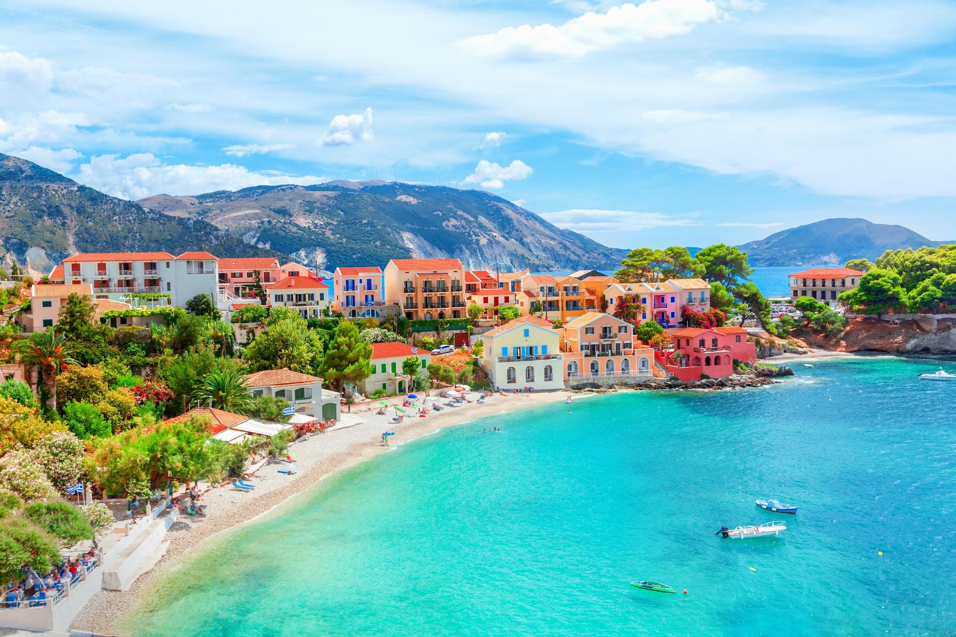 Beach with turquise water in Kefalonia on a sunny day with some clouds