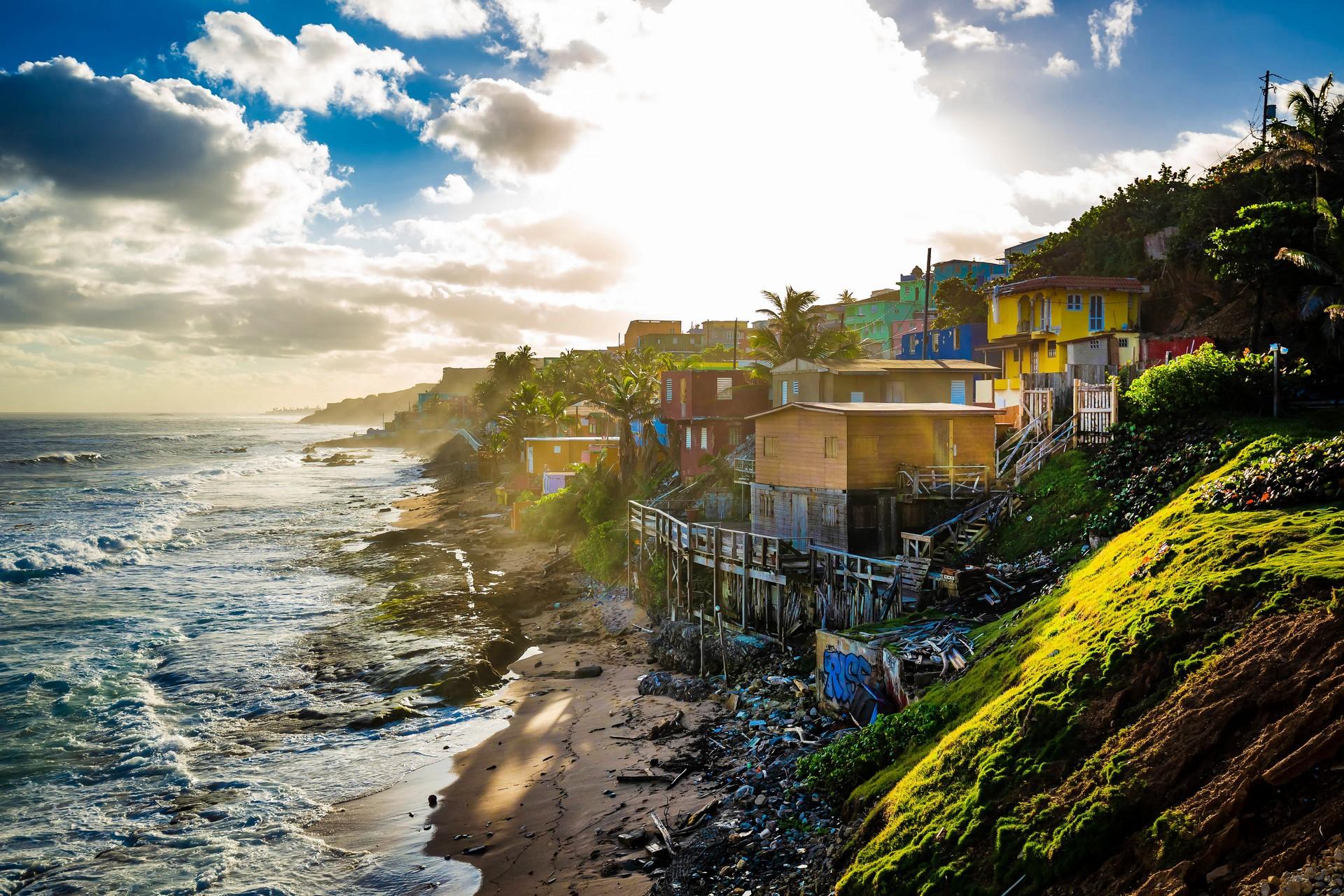 Beach and countryside in San Juan at sunset time