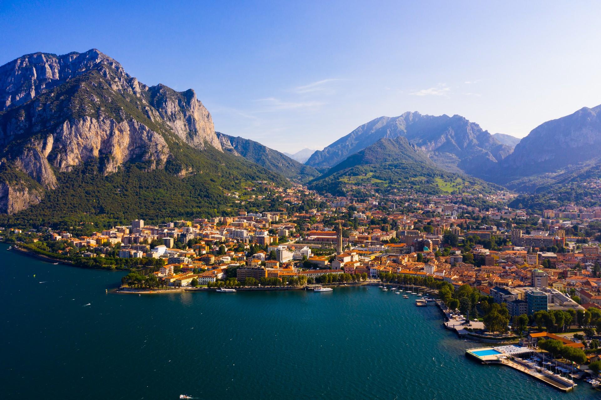 Aerial view of mountain range in Lecco in partly cloudy weather