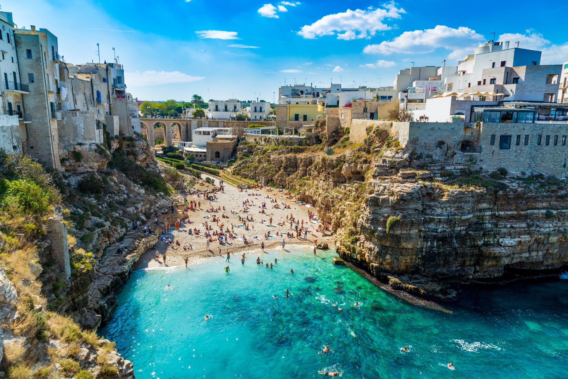 Aerial view of architecture in Polignano a Mare in partly cloudy weather