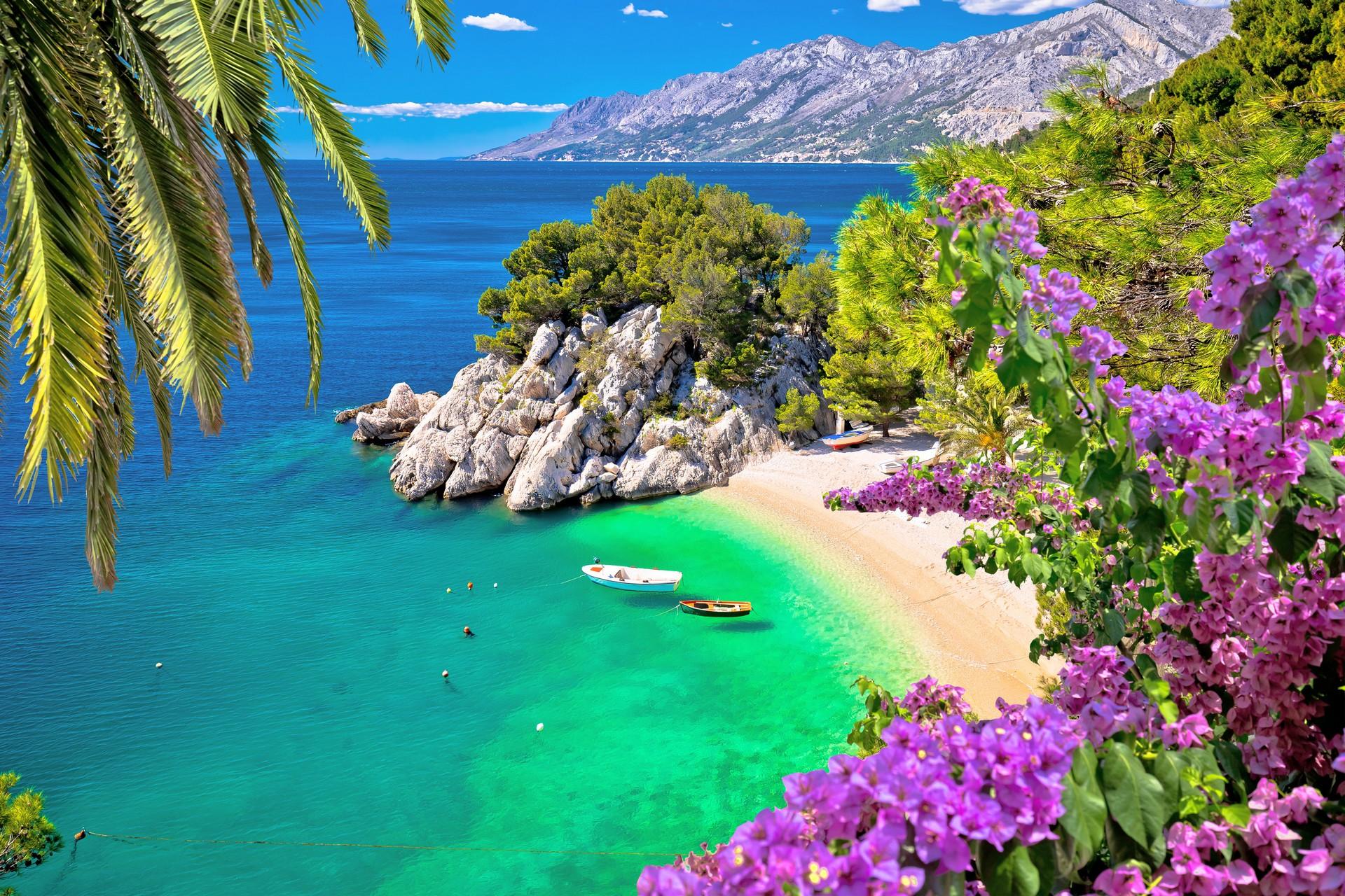 Enjoyable beach with turquise water near Omiš on a sunny day with some clouds