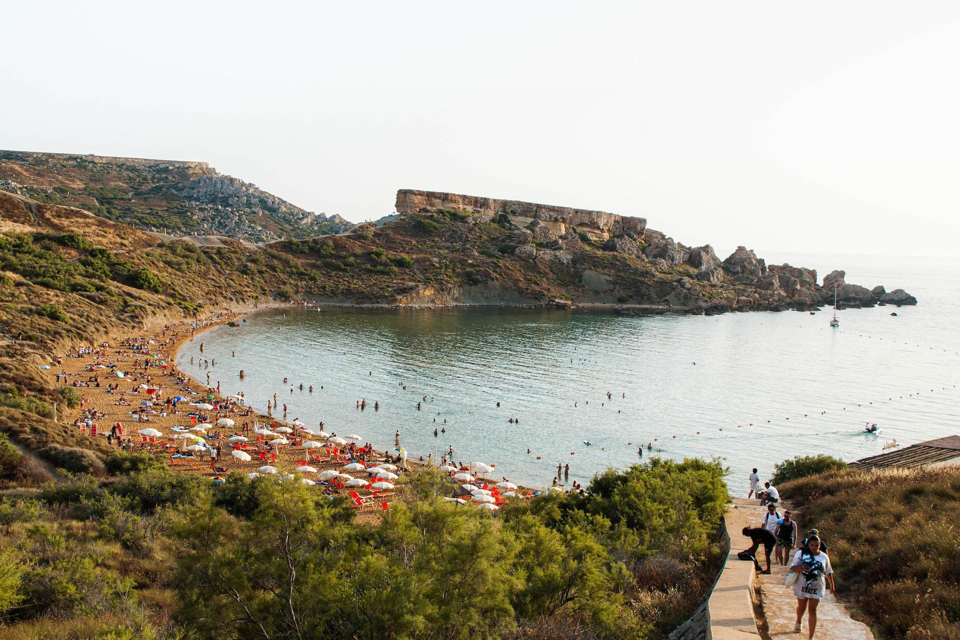 Malta: Riviera Beach with people.