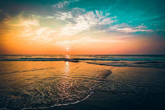 Beautiful sunset on a beach in Goa, India
