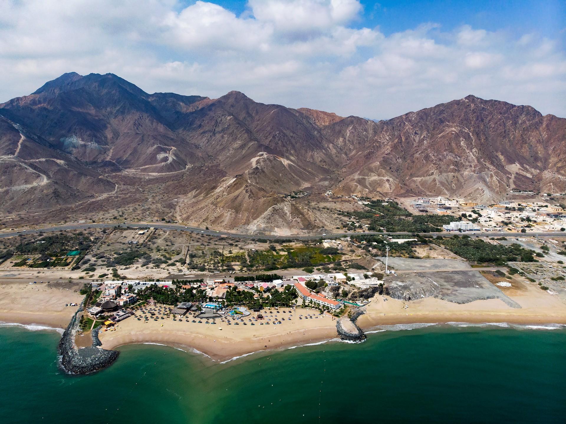 Aerial view of awesome beach in Al Fujayrah on a cloudy day