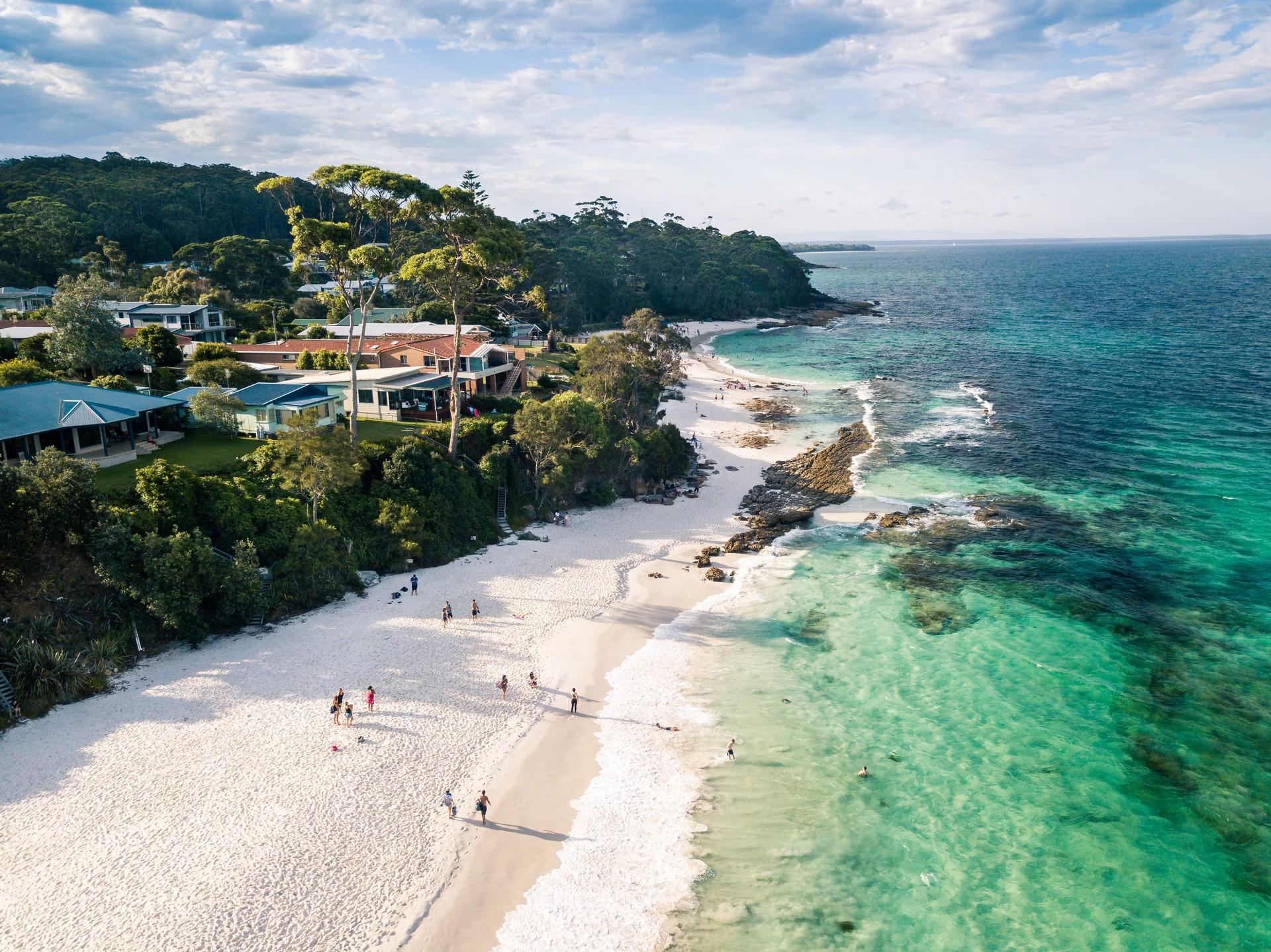 Aerial view of nice beach in Hyams Beach on a day with cloudy weather