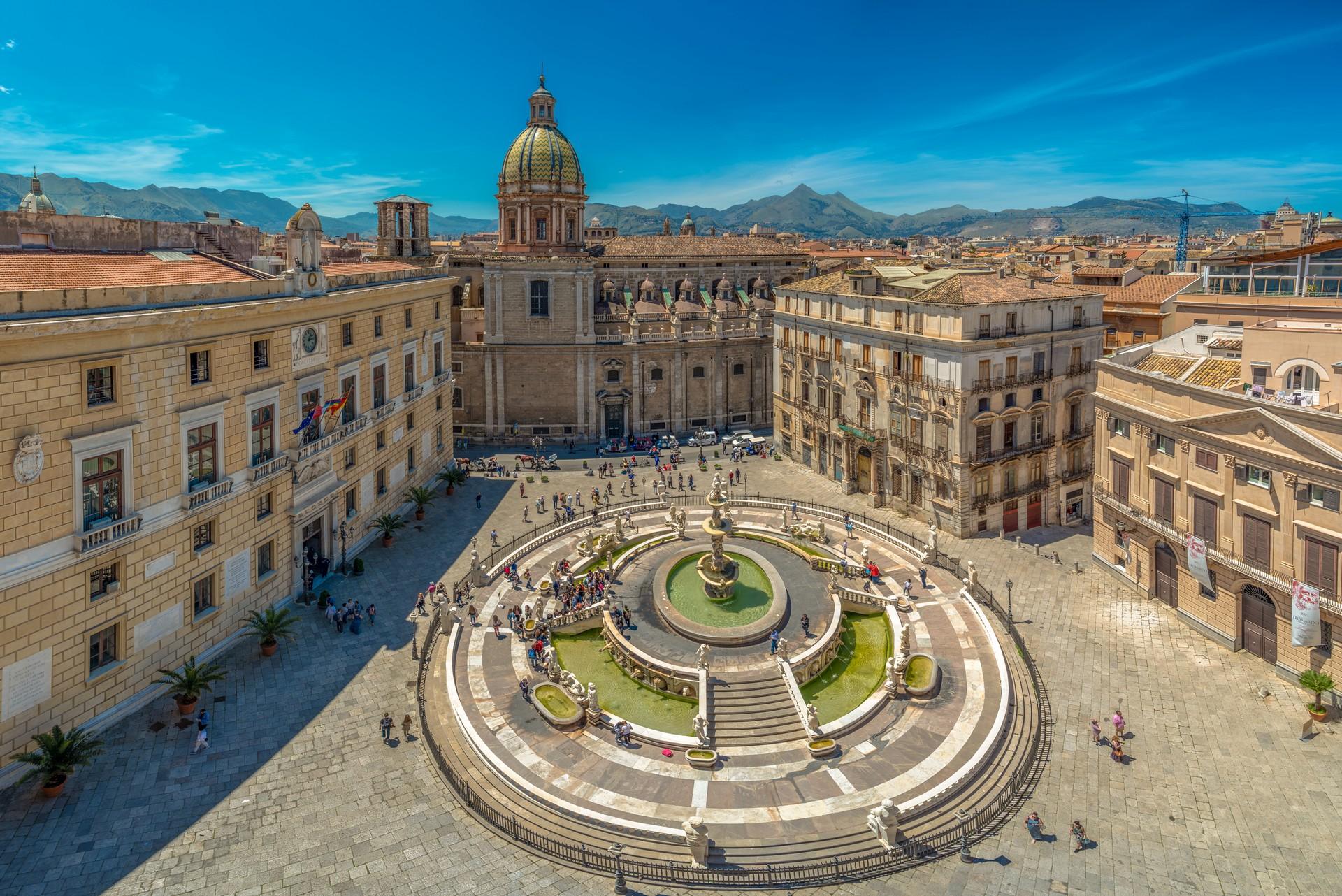 Aerial view of city square in Palermo on a sunny day with some clouds