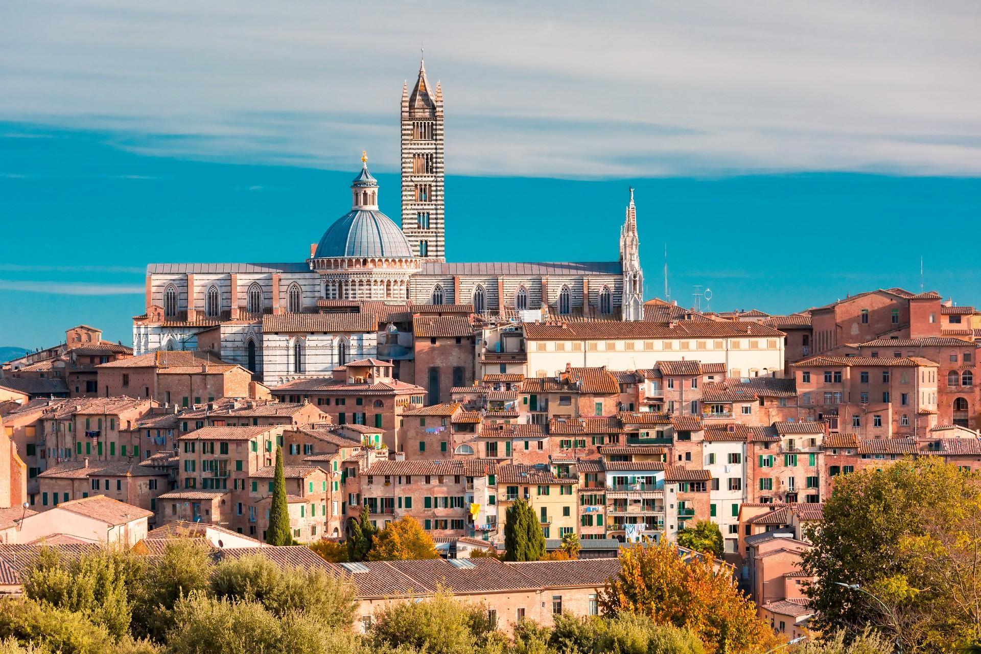 Architecture in Siena on a sunny day with some clouds