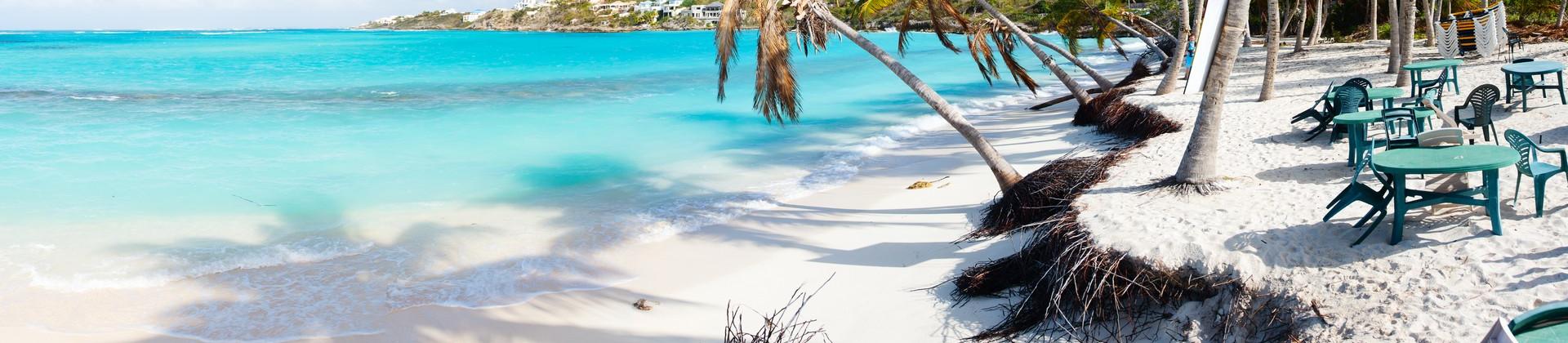 Enjoyable beach with turquise water in Anguilla on a sunny day with some clouds