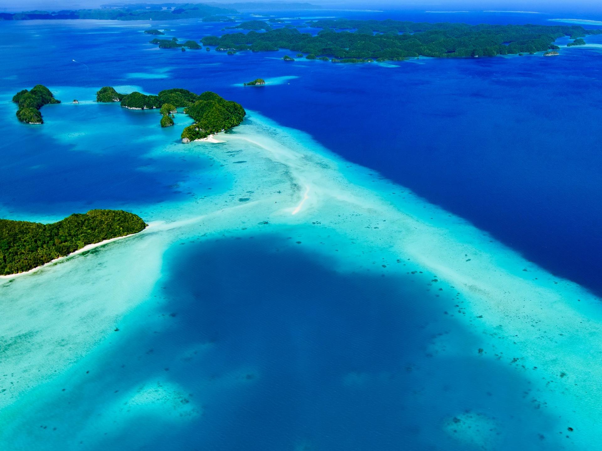 Aerial view of beach with turquise water in Koror