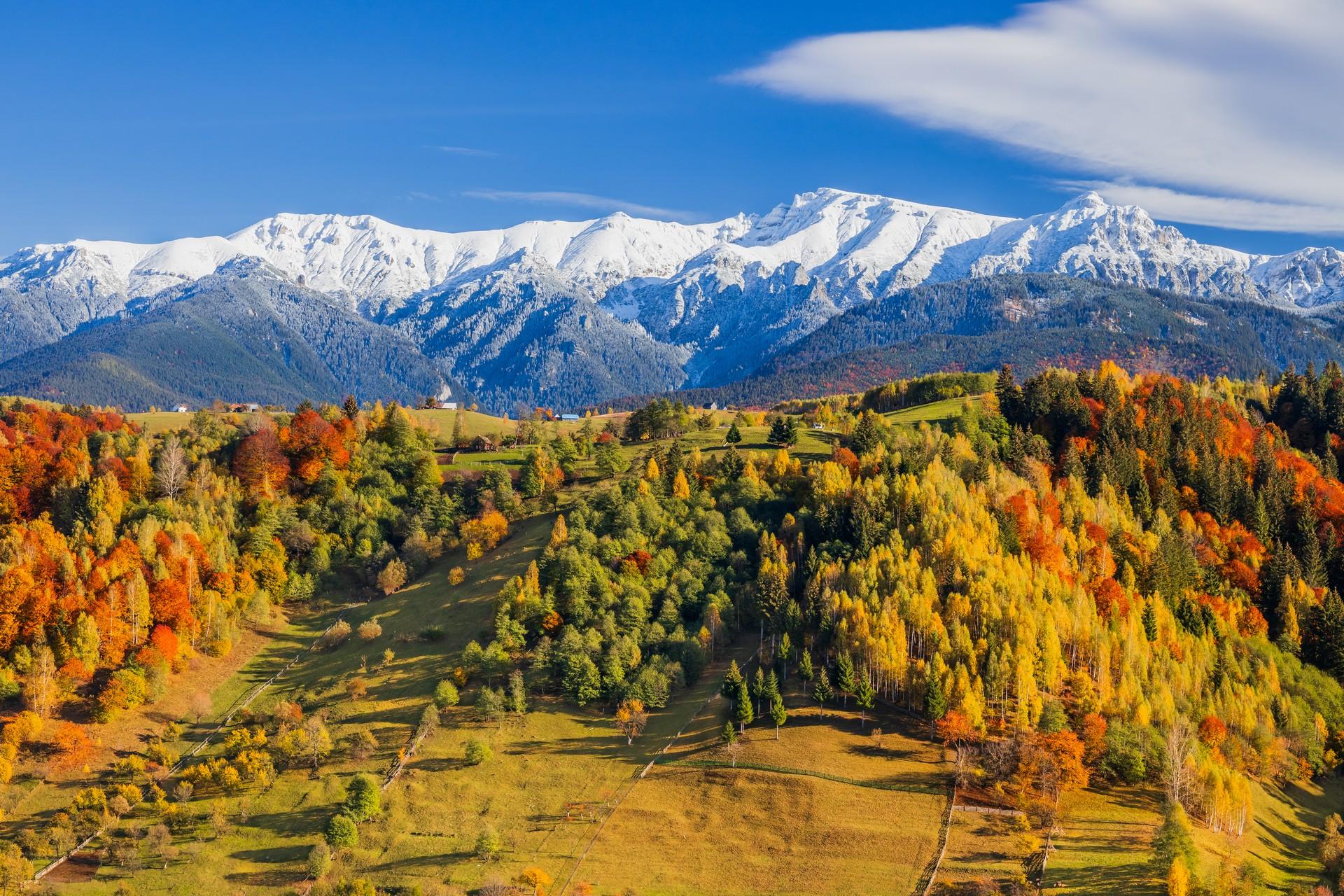 Mountain range near Brasov in sunny weather with few clouds