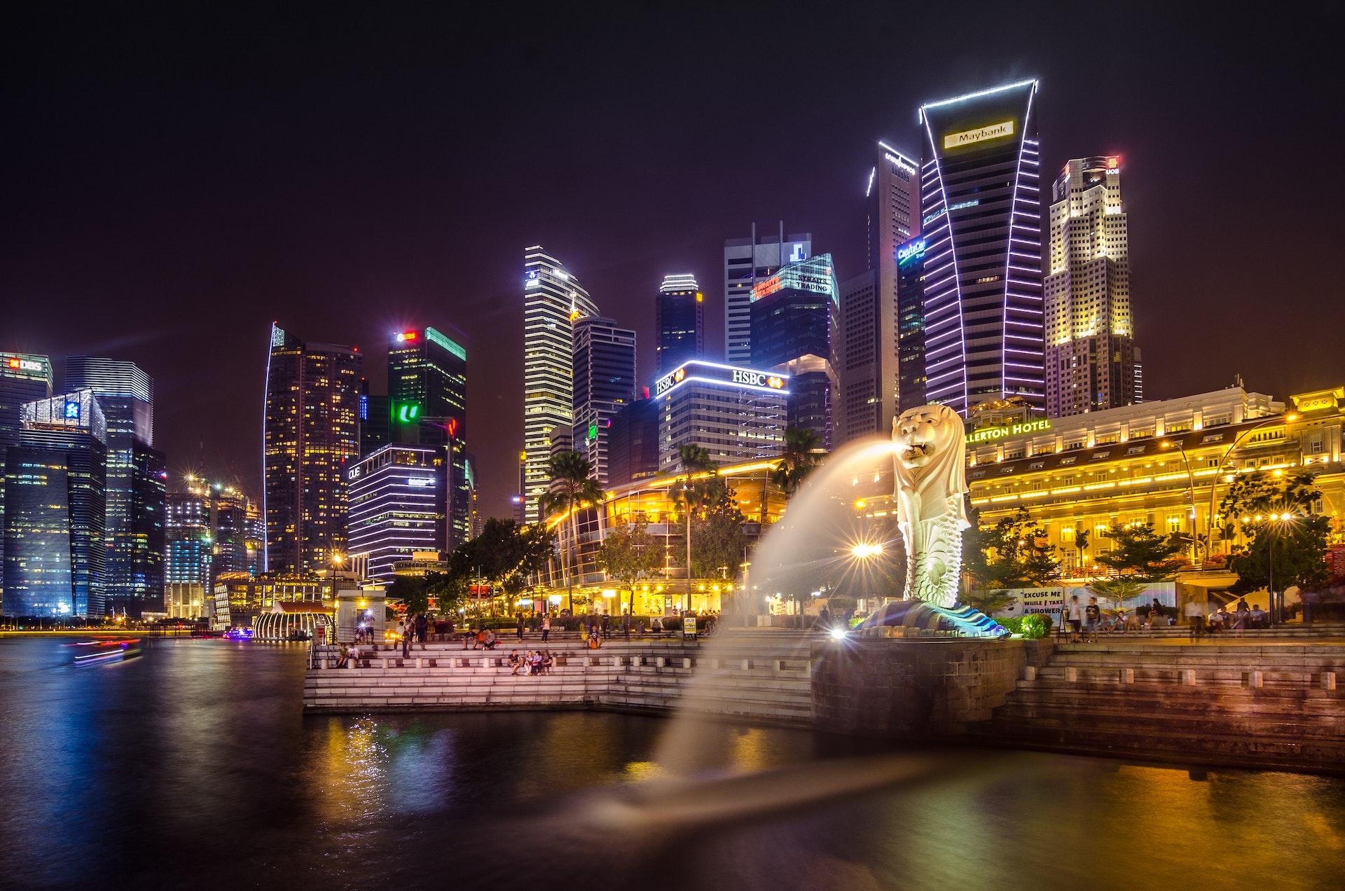 View of illuminated Singapore in the dark.