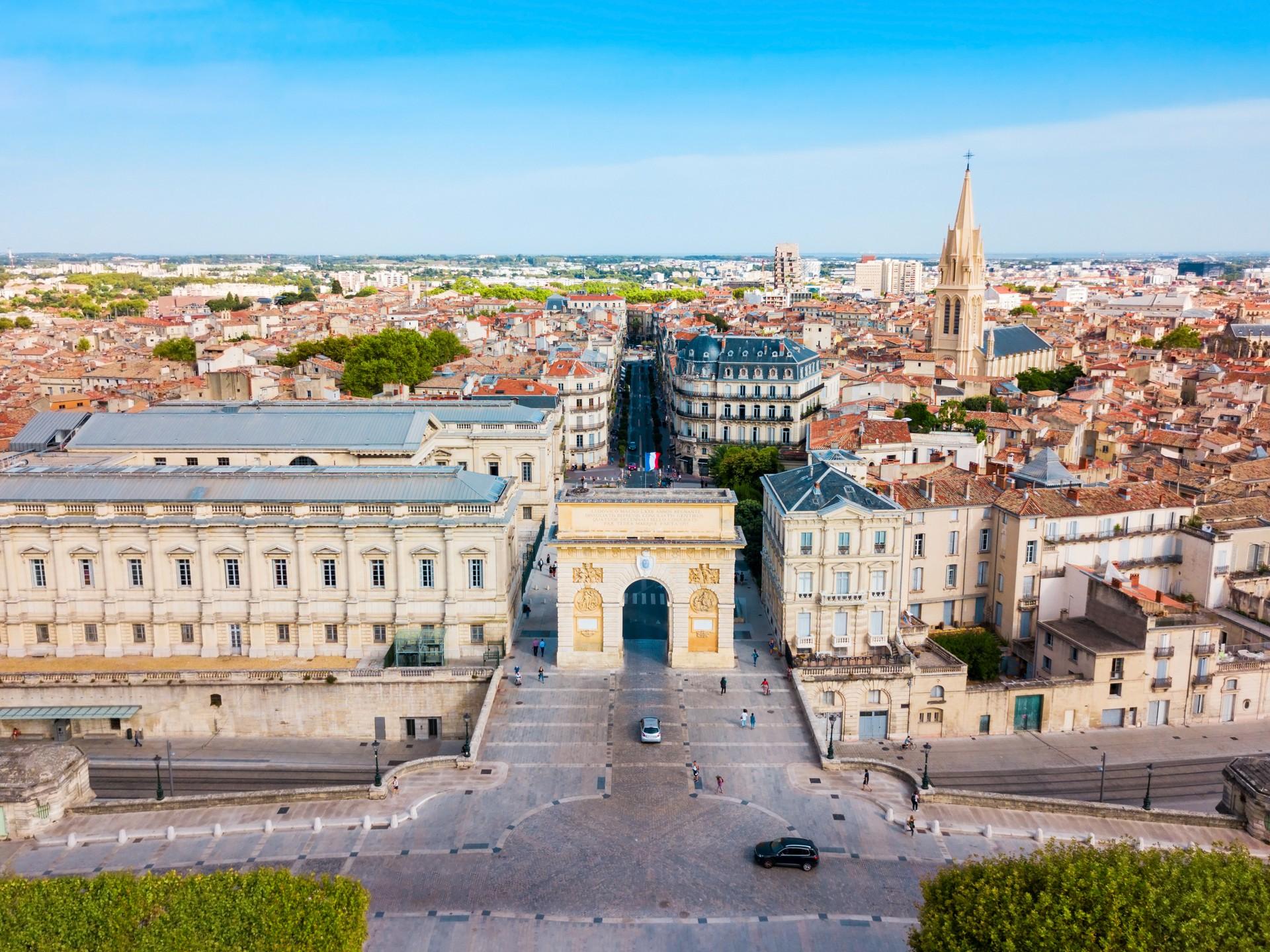 Aerial view of city square in Montpellier in sunny weather with few clouds