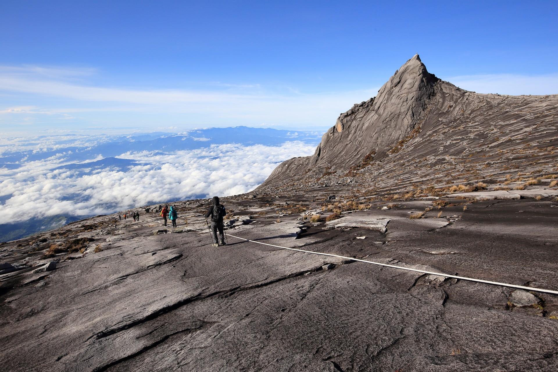 Mountain range near Kota Kinabalu on a sunny day with some clouds