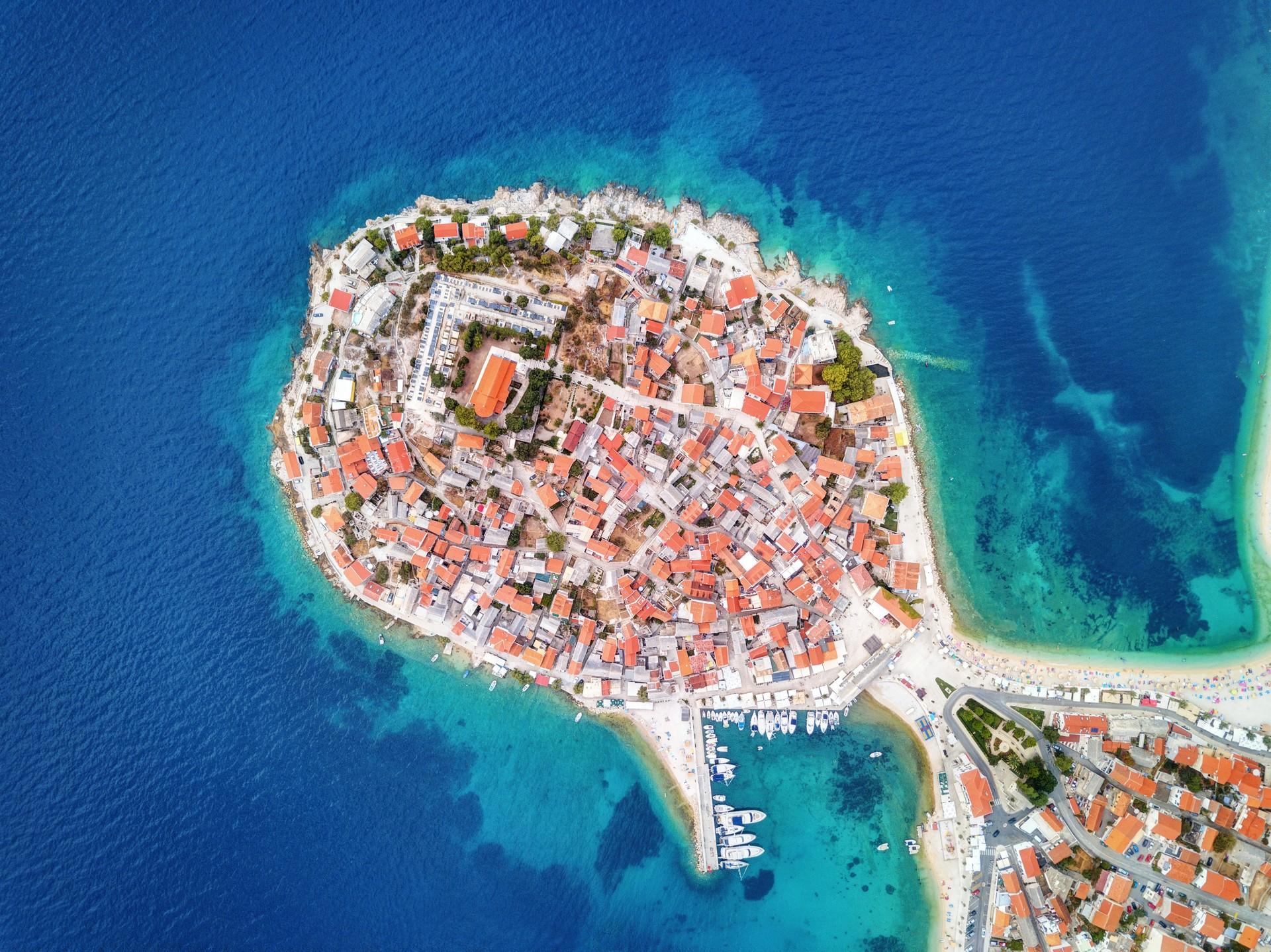 Aerial view of beach with turquise water in Primošten