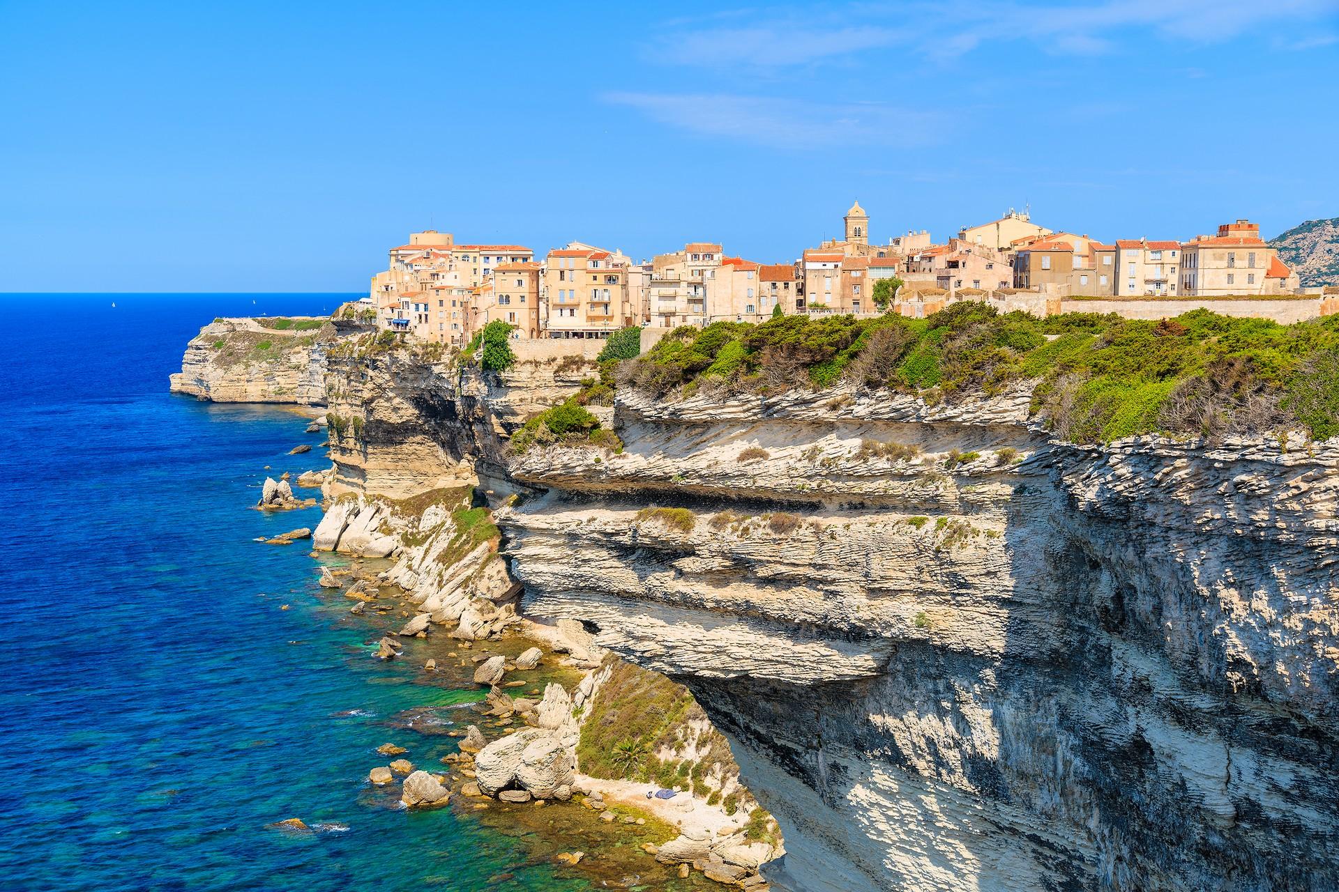 Beach in Bonifacio in sunny weather with few clouds