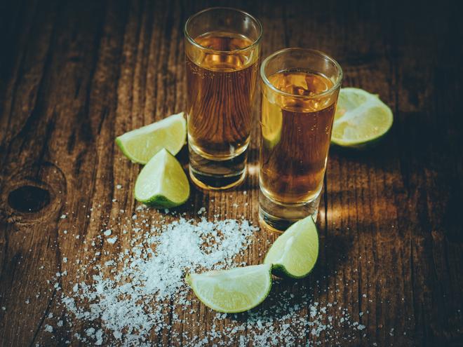 Mexican tequila shots with lime and salt.
