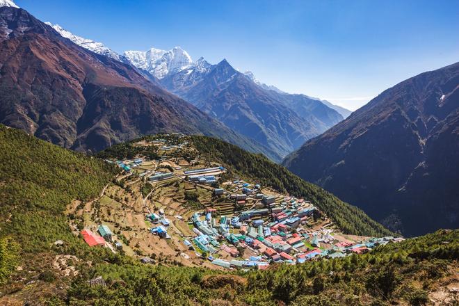 Beautiful view of Namche bazaar (Nepal) surrounded by Himalayan peaks in clear weather. 