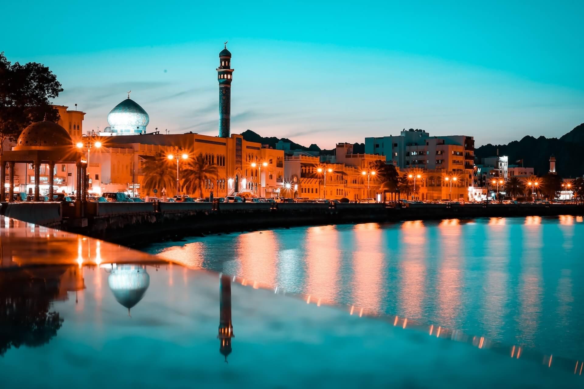 View of the night city of Muscat and sea, Oman